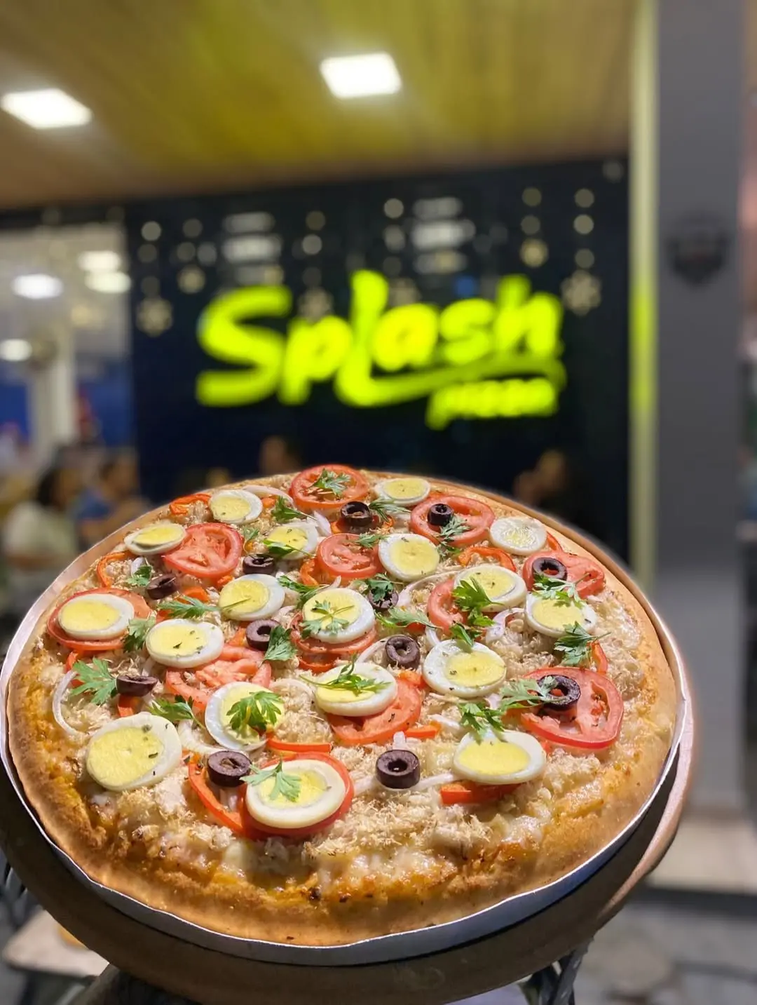 Pizza com bastante recheio da Splash